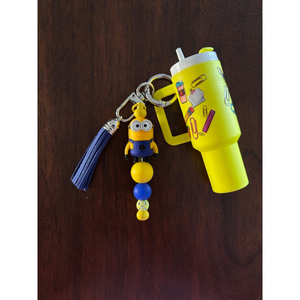 Yellow Tumbler Keychain with Blue Tassel and School Graphics